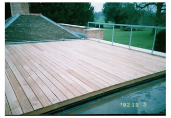 Wooden floor decking, Buntingford. Roof terrace with new wood decking..