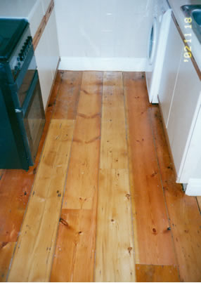 Pine floor board stripping in Harlow, Essex. We stripped and sanded these existing pine floorboards..